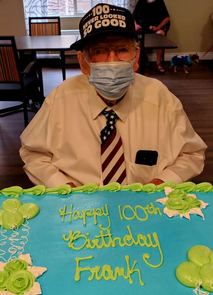 Frank enjoys his 100th birthday cake!