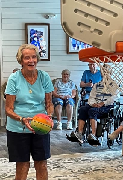 One Carolina Park resident steps up to the line and gets ready to take her shot during basketball.