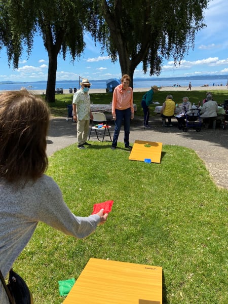 Residents and team members enjoyed some cornhole under the sun.