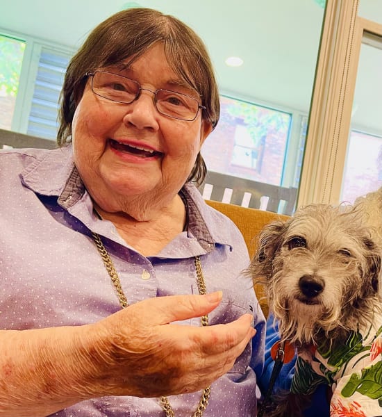 A First Hill resident snuggles up with a cute pup!