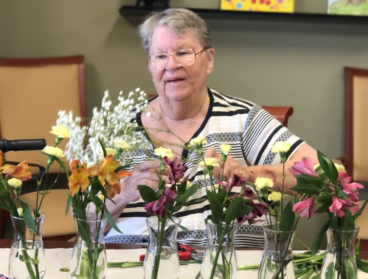 The Oaks resident puts together some wonderful arrangements during flower arranging club.