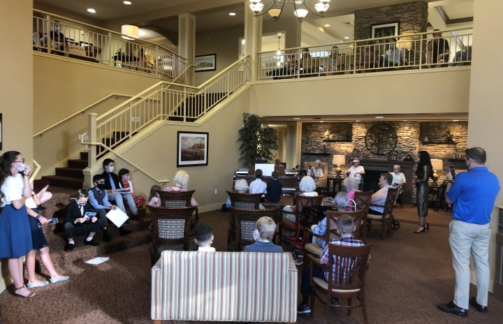 The Oaks hosted a local piano recital as residents gathered around to hear the wonderful music.