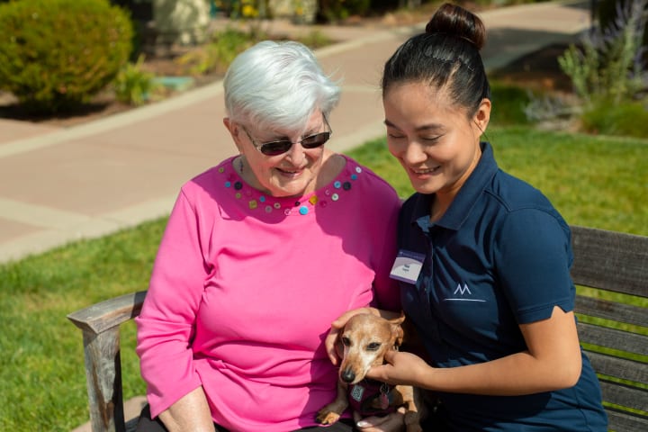 Resident and Team Member and dog