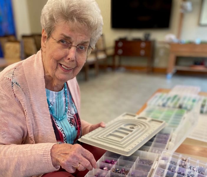 One Woodstock resident looks through beads for her next creation.