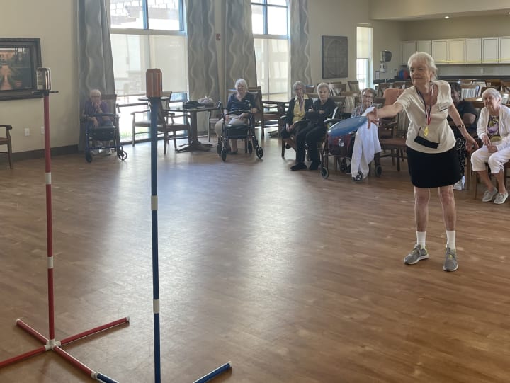 Solivita Marketplace residents lined up their shots for the frisbee toss!