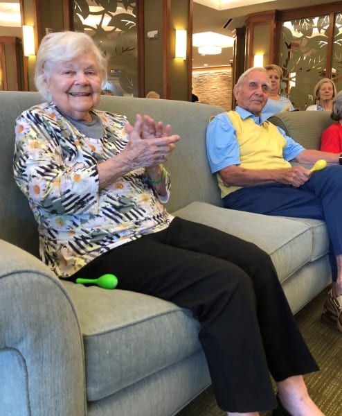 Residents enjoying live music together in the common space