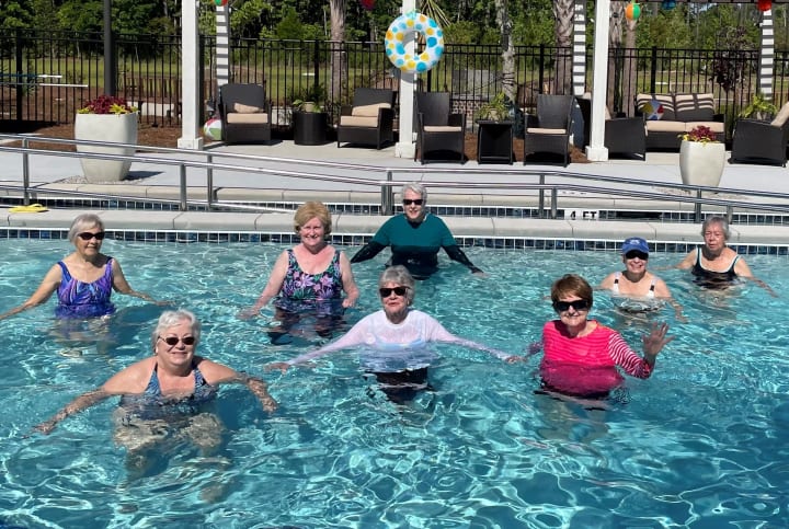 Carolina Park residents enjoy water aerobics in the brand new pool!